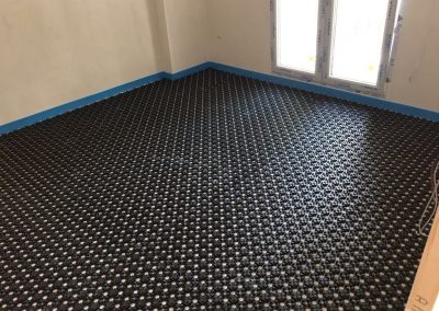 Instalación suelo radiante con panel de tetones
